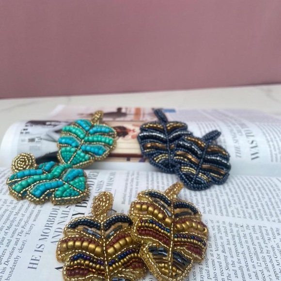 Handmade tendrils with a variety of colors in the shape of a palm leaf - Picture 2 of 4